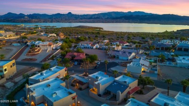 Enjoy panoramic views of the lake, golf course, and surrounding on London Bridge Golf Course in Arizona - for sale on GolfHomes.com, golf home, golf lot