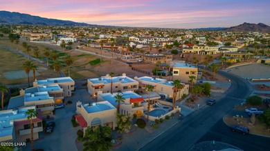 Enjoy up-close panoramic views of the lake and surrounding on London Bridge Golf Course in Arizona - for sale on GolfHomes.com, golf home, golf lot