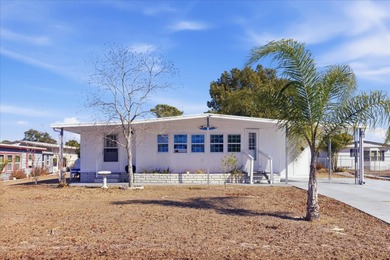 Located in the gated 55+ Brookridge golf community with a on Brookridge Country Club in Florida - for sale on GolfHomes.com, golf home, golf lot