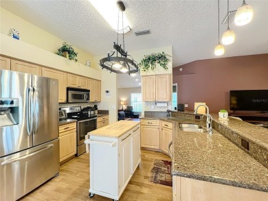 Welcome home to the highly desirable and beautiful Tuscawilla on Tuscawilla Country Club in Florida - for sale on GolfHomes.com, golf home, golf lot