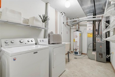 Move right in and enjoy easy Stillwater living with thoughtful on Loggers Trail Golf Club in Minnesota - for sale on GolfHomes.com, golf home, golf lot