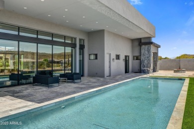 This stunning contemporary home situated in Blackstone Country on Blackstone Country Club in Arizona - for sale on GolfHomes.com, golf home, golf lot