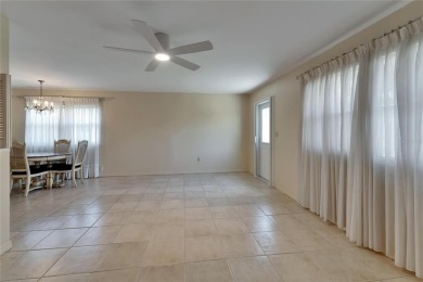 Hoping to live in a home immersed in Florida's natural beauty?
 on Kings Point Executive Golf Course in Florida - for sale on GolfHomes.com, golf home, golf lot