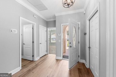 Enjoy low-maintenance golf-course living in this well maintained on Laurel Island Links in Georgia - for sale on GolfHomes.com, golf home, golf lot
