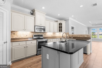 Enjoy low-maintenance golf-course living in this well maintained on Laurel Island Links in Georgia - for sale on GolfHomes.com, golf home, golf lot