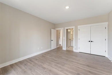 Live the lake life in this NEW Craftsman home in The Plantation on The Patriot Golf Club At Grand Harbor in South Carolina - for sale on GolfHomes.com, golf home, golf lot