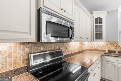 Enjoy low-maintenance golf-course living in this well maintained on Laurel Island Links in Georgia - for sale on GolfHomes.com, golf home, golf lot