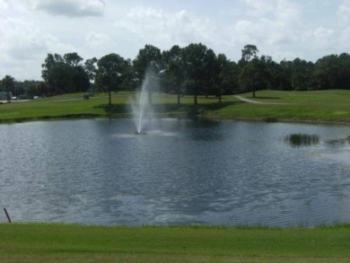 This lovely manufactured 2 bedroom, two bathroom home is on on Lake Fairways Country Club in Florida - for sale on GolfHomes.com, golf home, golf lot