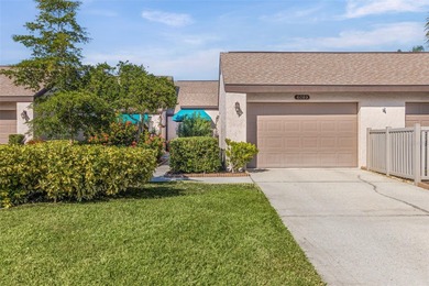 Welcome to this pristine and impeccably maintained 3-bedroom on University Park Country Club in Florida - for sale on GolfHomes.com, golf home, golf lot