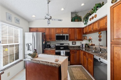 Welcome to this pristine and impeccably maintained 3-bedroom on University Park Country Club in Florida - for sale on GolfHomes.com, golf home, golf lot