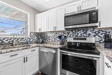 Beautifully updated 3 bedroom, 2 bath pool home in desirable on Daytona Beach Golf Club in Florida - for sale on GolfHomes.com, golf home, golf lot