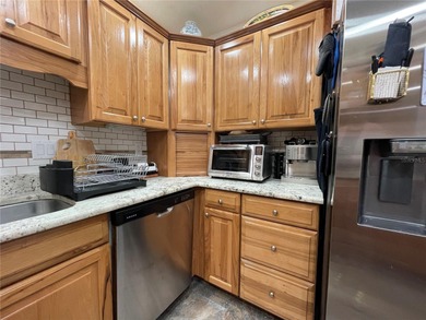 EXQUISITE Lakefront 55+ Residence | 2 Bed | 2 Bath | Private on Country Club At Silver Springs Shores in Florida - for sale on GolfHomes.com, golf home, golf lot