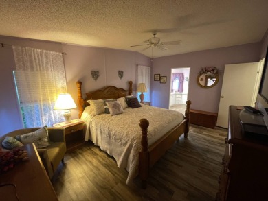 Beautifully Maintained Home in the Gated Community of Pine on Pine Lakes Country Club in Florida - for sale on GolfHomes.com, golf home, golf lot