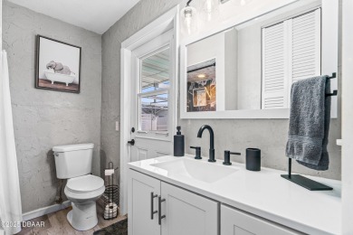 Beautifully updated 3 bedroom, 2 bath pool home in desirable on Daytona Beach Golf Club in Florida - for sale on GolfHomes.com, golf home, golf lot