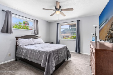 Beautifully updated 3 bedroom, 2 bath pool home in desirable on Daytona Beach Golf Club in Florida - for sale on GolfHomes.com, golf home, golf lot