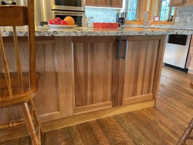 Beautiful open concept single level custom home overlooking the on Double Arrow Lodge in Montana - for sale on GolfHomes.com, golf home, golf lot