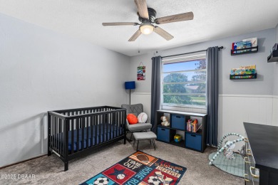 Beautifully updated 3 bedroom, 2 bath pool home in desirable on Daytona Beach Golf Club in Florida - for sale on GolfHomes.com, golf home, golf lot