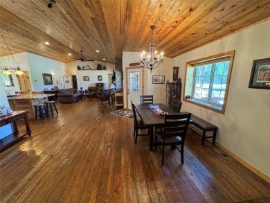 Beautiful open concept single level custom home overlooking the on Double Arrow Lodge in Montana - for sale on GolfHomes.com, golf home, golf lot