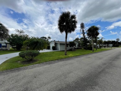 Beautifully Maintained Home in the Gated Community of Pine on Pine Lakes Country Club in Florida - for sale on GolfHomes.com, golf home, golf lot