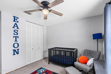 Beautifully updated 3 bedroom, 2 bath pool home in desirable on Daytona Beach Golf Club in Florida - for sale on GolfHomes.com, golf home, golf lot