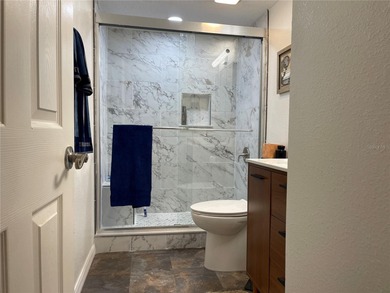 EXQUISITE Lakefront 55+ Residence | 2 Bed | 2 Bath | Private on Country Club At Silver Springs Shores in Florida - for sale on GolfHomes.com, golf home, golf lot