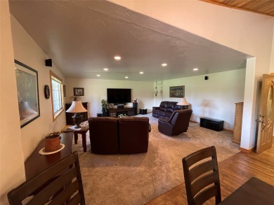 Beautiful open concept single level custom home overlooking the on Double Arrow Lodge in Montana - for sale on GolfHomes.com, golf home, golf lot