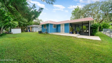 Discover 65 Deltona Blvd, where modern updates meet the on St. Augustine Shores Golf Club in Florida - for sale on GolfHomes.com, golf home, golf lot