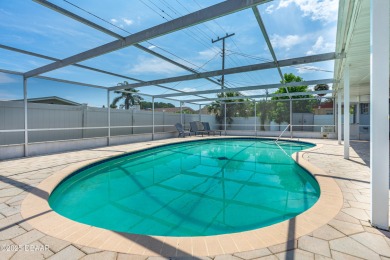 Beautifully updated 3 bedroom, 2 bath pool home in desirable on Daytona Beach Golf Club in Florida - for sale on GolfHomes.com, golf home, golf lot