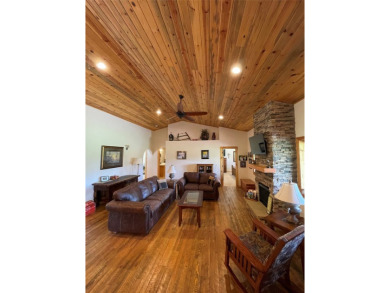 Beautiful open concept single level custom home overlooking the on Double Arrow Lodge in Montana - for sale on GolfHomes.com, golf home, golf lot