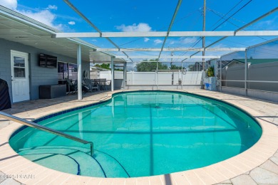 Beautifully updated 3 bedroom, 2 bath pool home in desirable on Daytona Beach Golf Club in Florida - for sale on GolfHomes.com, golf home, golf lot