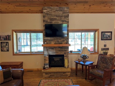 Beautiful open concept single level custom home overlooking the on Double Arrow Lodge in Montana - for sale on GolfHomes.com, golf home, golf lot