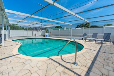 Beautifully updated 3 bedroom, 2 bath pool home in desirable on Daytona Beach Golf Club in Florida - for sale on GolfHomes.com, golf home, golf lot