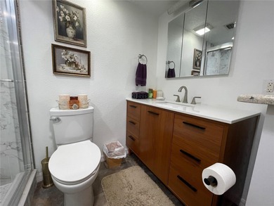 EXQUISITE Lakefront 55+ Residence | 2 Bed | 2 Bath | Private on Country Club At Silver Springs Shores in Florida - for sale on GolfHomes.com, golf home, golf lot