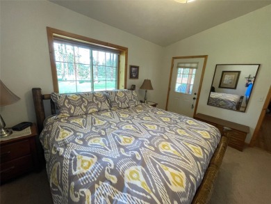 Beautiful open concept single level custom home overlooking the on Double Arrow Lodge in Montana - for sale on GolfHomes.com, golf home, golf lot