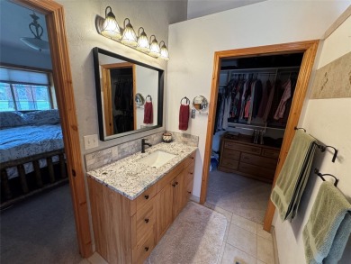 Beautiful open concept single level custom home overlooking the on Double Arrow Lodge in Montana - for sale on GolfHomes.com, golf home, golf lot