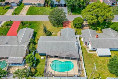 Beautifully updated 3 bedroom, 2 bath pool home in desirable on Daytona Beach Golf Club in Florida - for sale on GolfHomes.com, golf home, golf lot