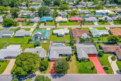 Beautifully updated 3 bedroom, 2 bath pool home in desirable on Daytona Beach Golf Club in Florida - for sale on GolfHomes.com, golf home, golf lot