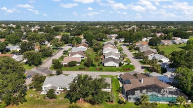 Prepared to be WOWED by this beautifully maintained golf course on Plantation Golf Club in Florida - for sale on GolfHomes.com, golf home, golf lot
