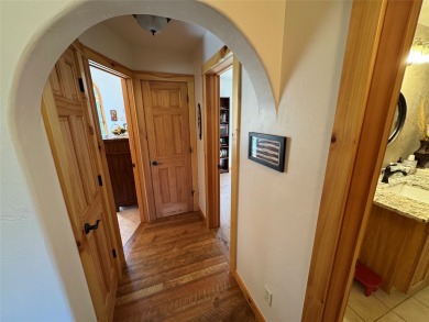 Beautiful open concept single level custom home overlooking the on Double Arrow Lodge in Montana - for sale on GolfHomes.com, golf home, golf lot