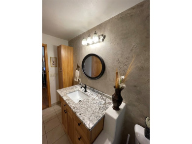 Beautiful open concept single level custom home overlooking the on Double Arrow Lodge in Montana - for sale on GolfHomes.com, golf home, golf lot