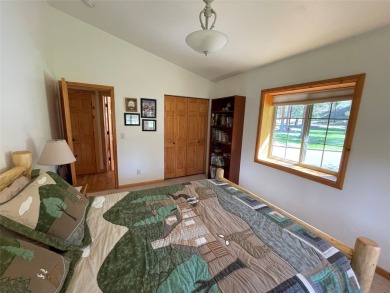 Beautiful open concept single level custom home overlooking the on Double Arrow Lodge in Montana - for sale on GolfHomes.com, golf home, golf lot