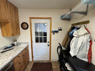 Beautiful open concept single level custom home overlooking the on Double Arrow Lodge in Montana - for sale on GolfHomes.com, golf home, golf lot