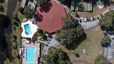 EXQUISITE Lakefront 55+ Residence | 2 Bed | 2 Bath | Private on Country Club At Silver Springs Shores in Florida - for sale on GolfHomes.com, golf home, golf lot