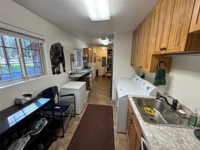 Beautiful open concept single level custom home overlooking the on Double Arrow Lodge in Montana - for sale on GolfHomes.com, golf home, golf lot