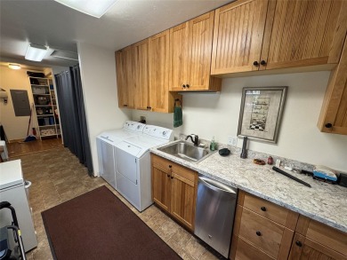 Beautiful open concept single level custom home overlooking the on Double Arrow Lodge in Montana - for sale on GolfHomes.com, golf home, golf lot