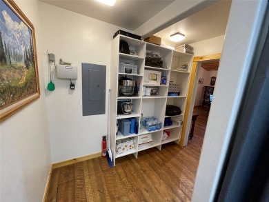 Beautiful open concept single level custom home overlooking the on Double Arrow Lodge in Montana - for sale on GolfHomes.com, golf home, golf lot