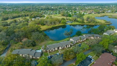 EXQUISITE Lakefront 55+ Residence | 2 Bed | 2 Bath | Private on Country Club At Silver Springs Shores in Florida - for sale on GolfHomes.com, golf home, golf lot