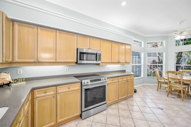 Under contract-accepting backup offers. Welcome Home to 1532 on East Lake Woodlands Country Club in Florida - for sale on GolfHomes.com, golf home, golf lot