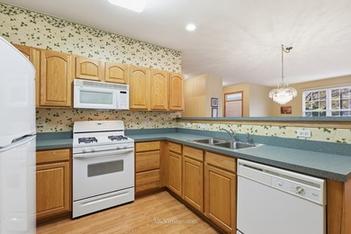 Welcome to this beautiful RANCH townhome situated on a premium on Carillon Lakes 3 Hole Course in Illinois - for sale on GolfHomes.com, golf home, golf lot
