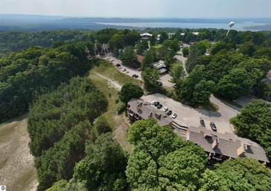 Welcome to your perfect Northern Michigan getaway! This on  in Michigan - for sale on GolfHomes.com, golf home, golf lot